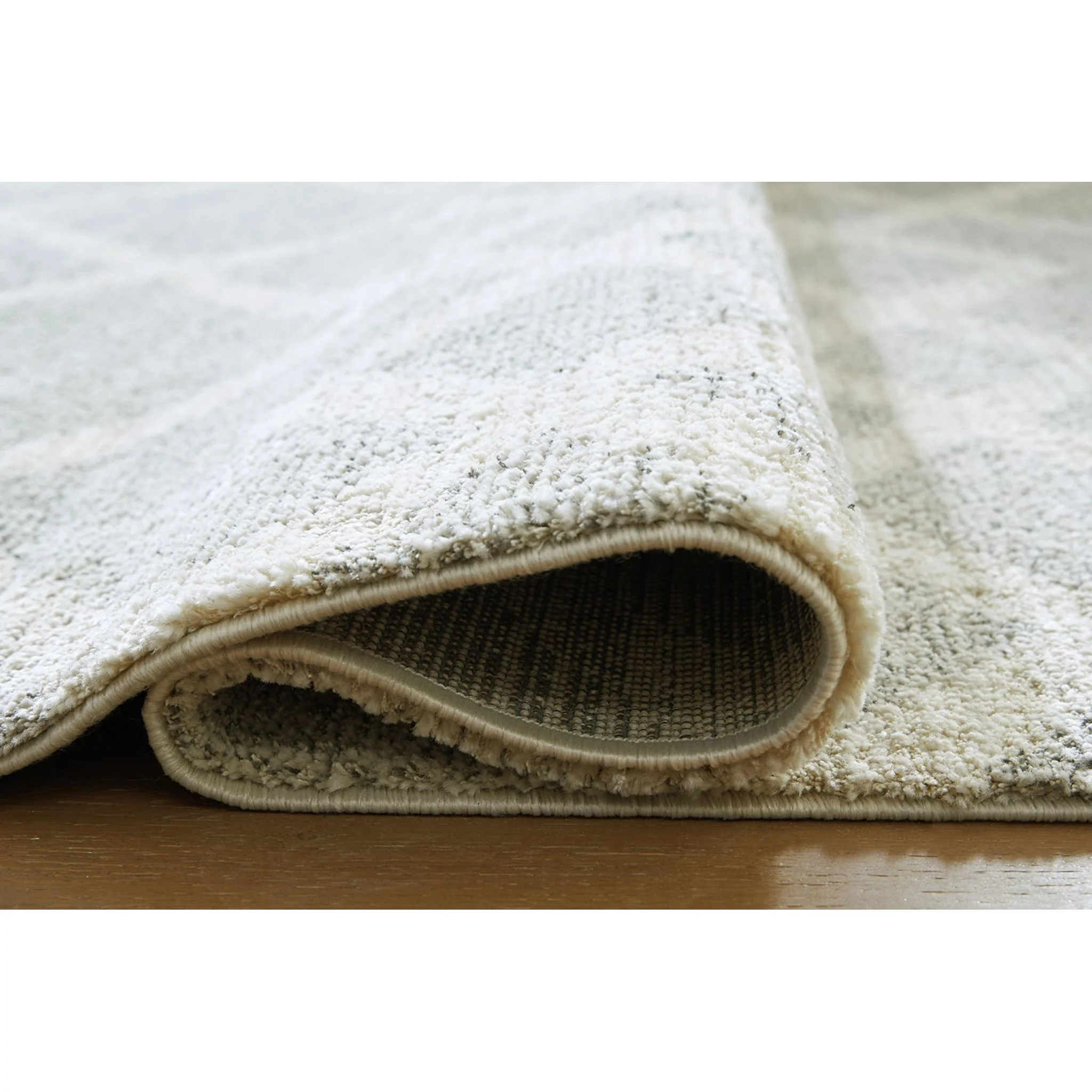 Unawick Area Rug - Image 11